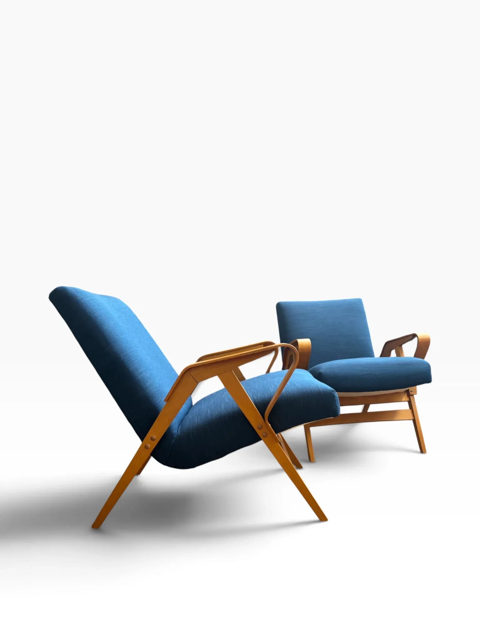 Set of 2 blue lounge chairs restored by František Jirák for Tatra Nabytok.