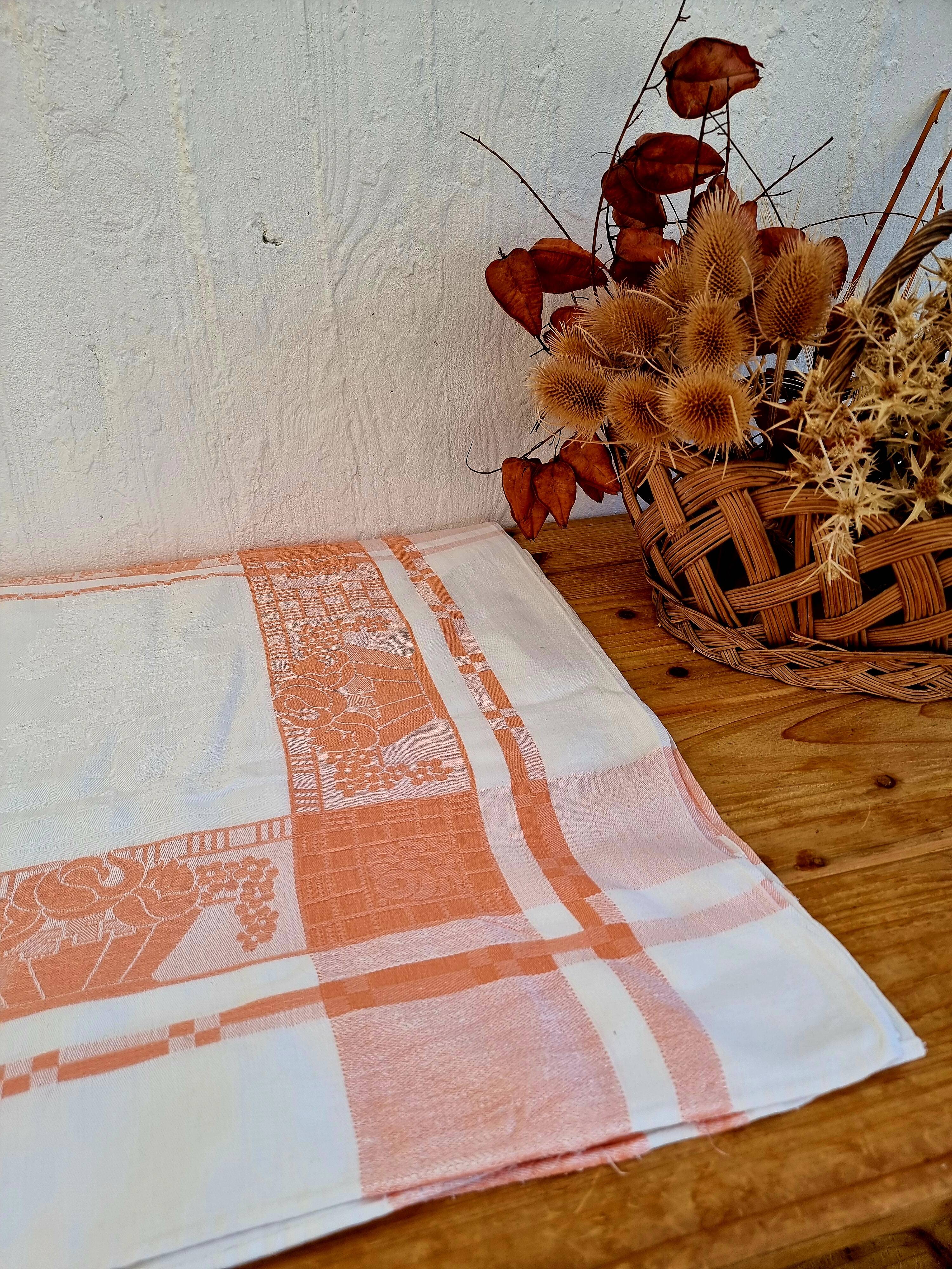 Antique orange and white damask tablecloth