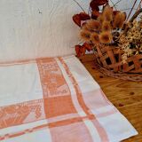 Antique orange and white damask tablecloth