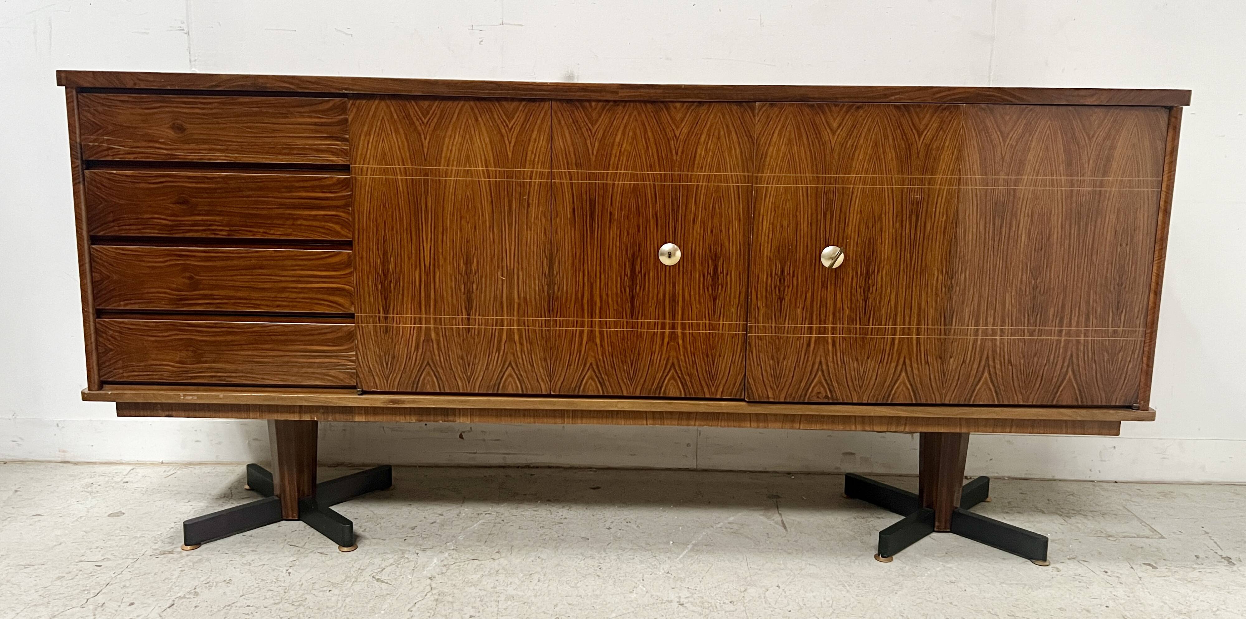 Scandinavian enfilade in veneered wood with iron legs, 20th century.