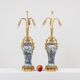 Pair of porcelain lamps decorated with bronze satyrs. Circa 1880.