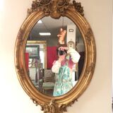 Miroir ovale en bois doré 98x63 cm