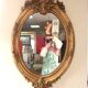 Oval mirror in gilded wood 98x63 cm