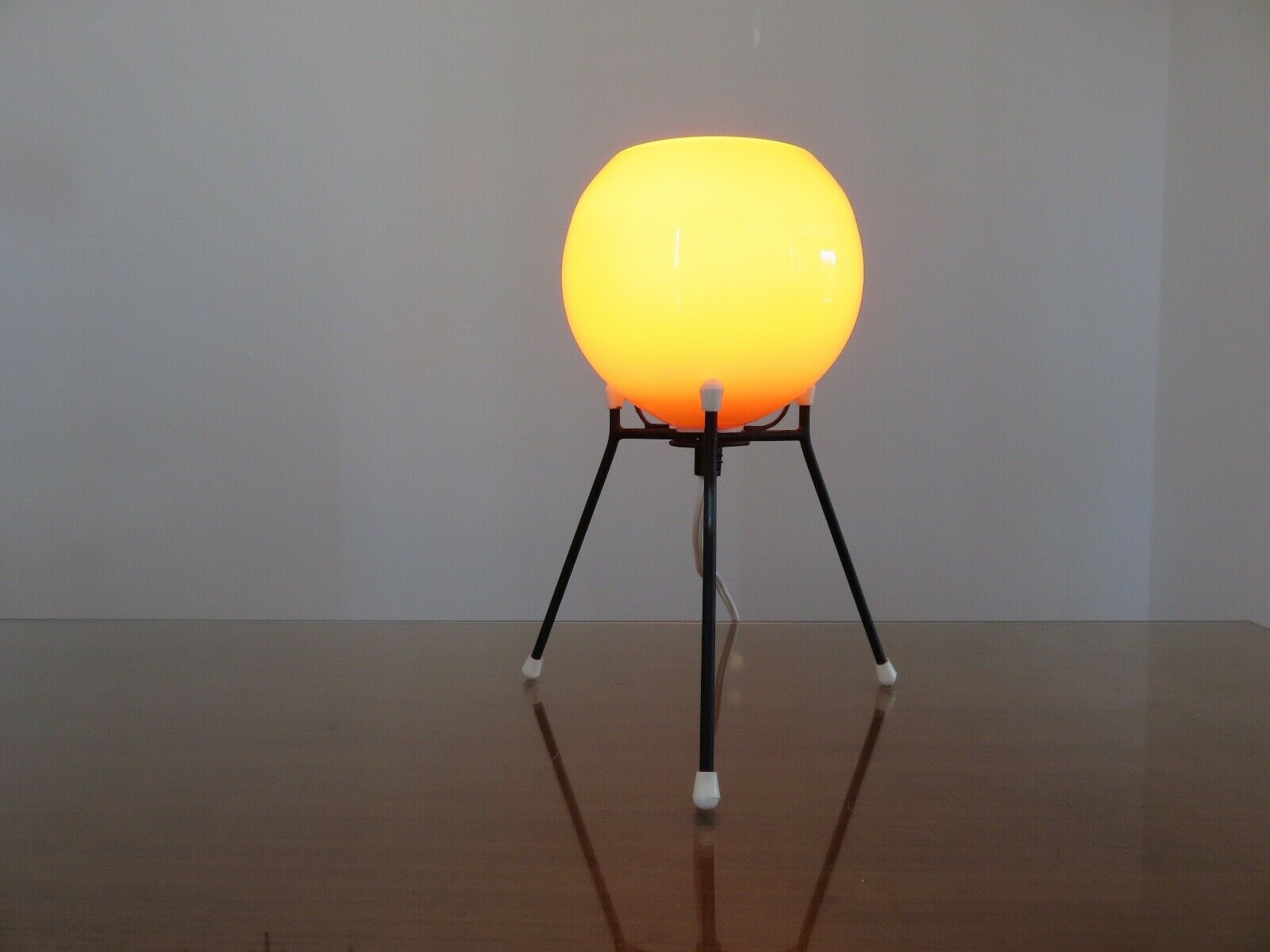 Tripod lamp "Sputnik" in orange opaline and black lacquered metal 60s 70s