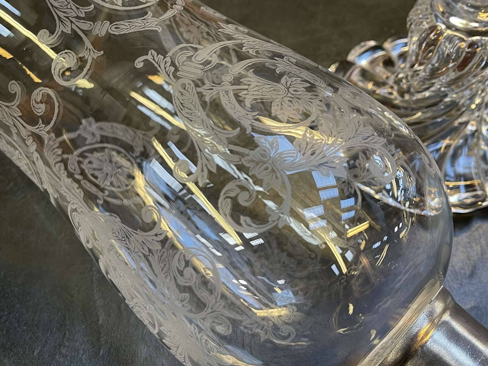 Baccarat crystal lantern with engraved foliage decoration.