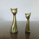 Couple of stylized cats in brass 70s