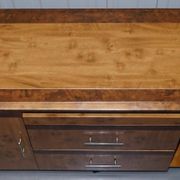 Walnut Burr buffet with drawers and wheels, part of a set.