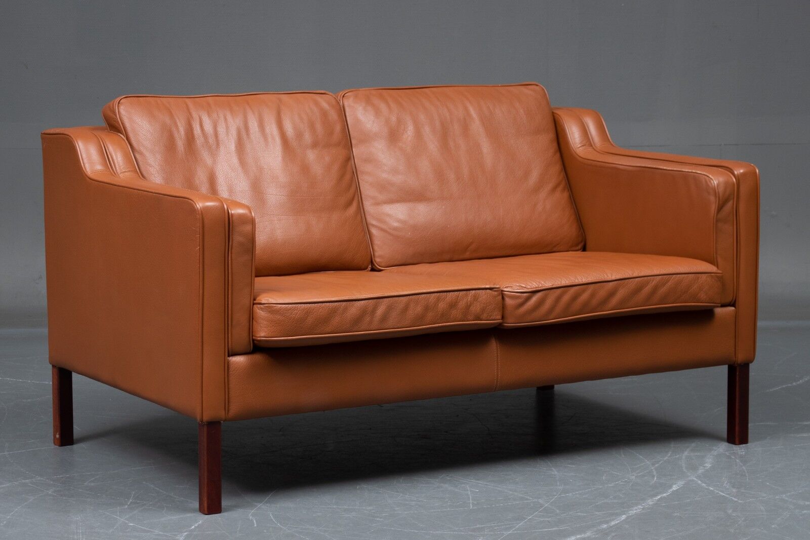VINTAGE DANISH MID CENTURY STOUBY 2 PERSON SOFA IN COGNAC LEATHER