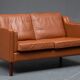 VINTAGE DANISH MID CENTURY STOUBY 2 PERSON SOFA IN COGNAC LEATHER