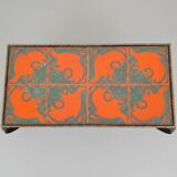 Vintage coffee table in glazed ceramic and wrought iron.