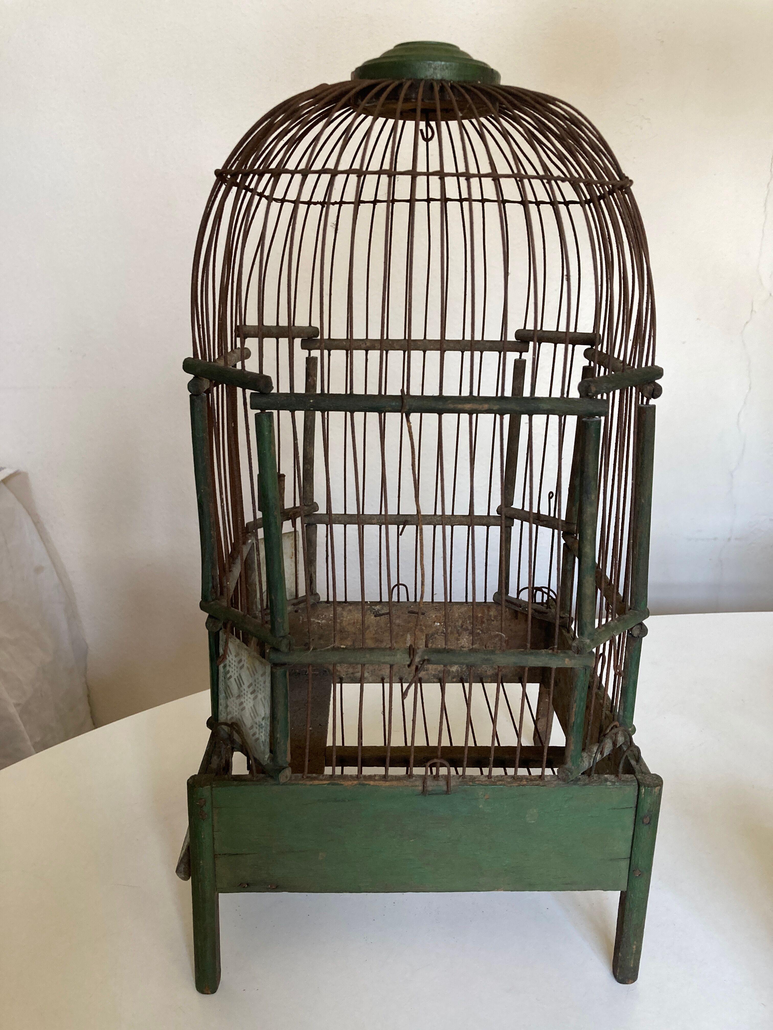 Octagonal bird cage made of wood and wire around 1920