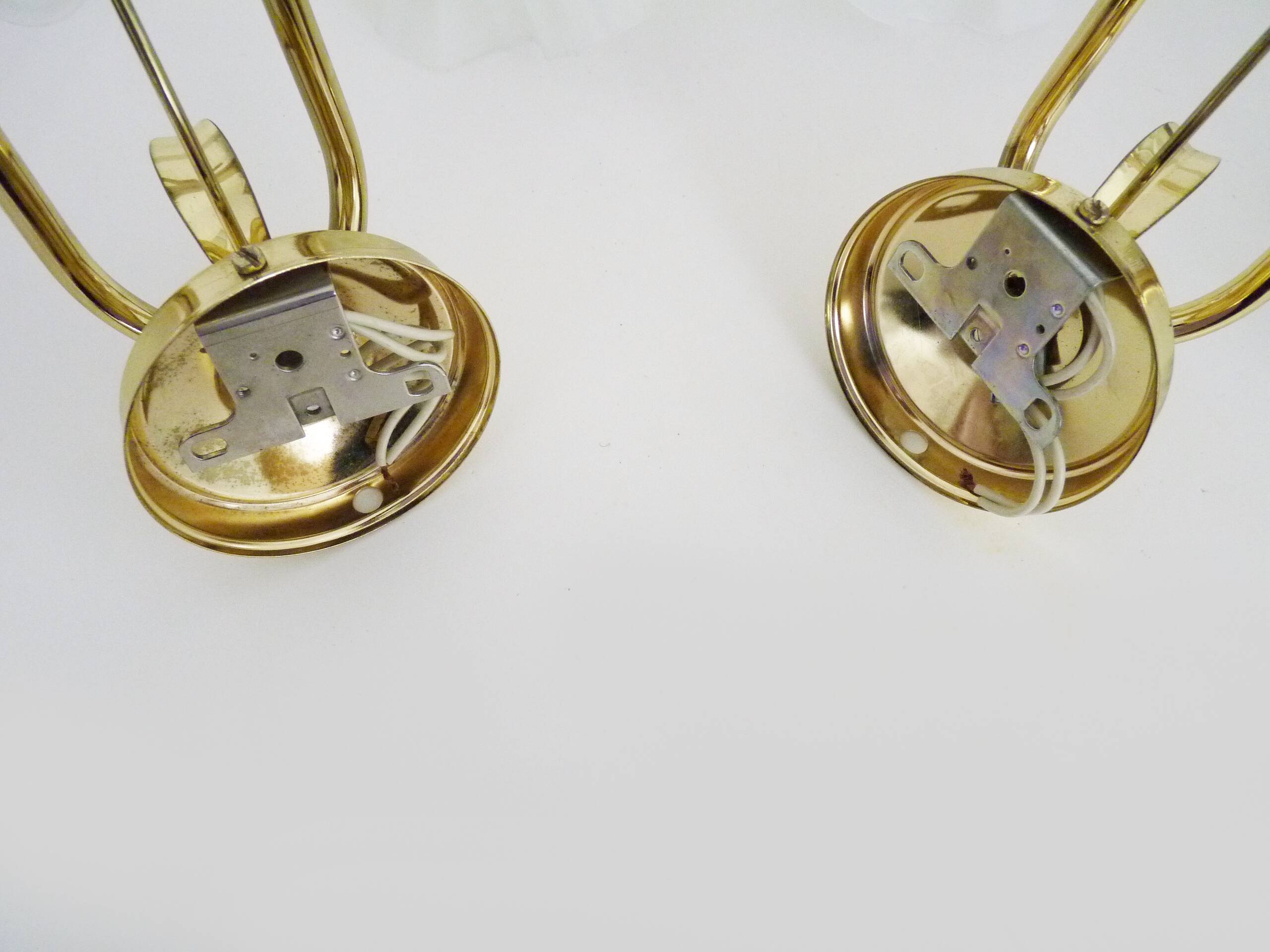 Pair of vintage brass wall lights with flower and glass tulip. 80 years