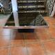 Chrome coffee table with smoked mirror top