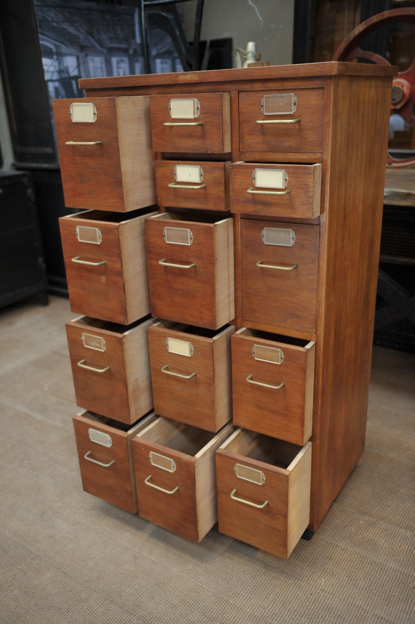Office furniture has oak drawers 1950 brass handles and label holders