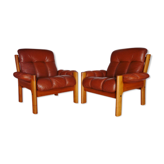 Deux fauteuils scandinaves en teck Ekornes