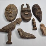 Collection of passport masks and sculptures in wood and terracotta, 7 pieces, 5 to 18 cm