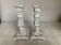 Pair of patinated cast iron candlesticks