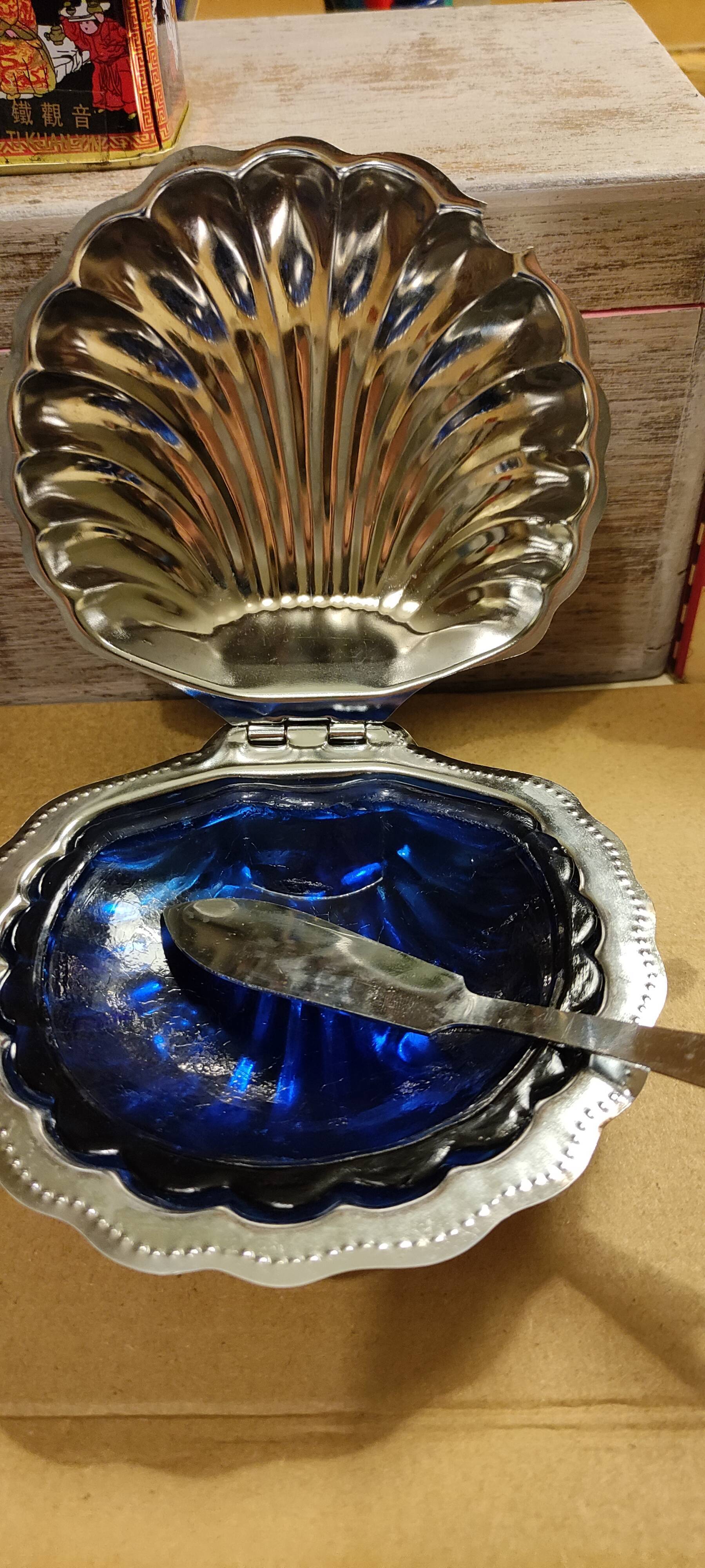 Vintage silver metal butter in shell shape
