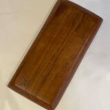 Teak pocket emptier