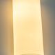 Pair of large opaline glass wall lights in brass designed by Limburg, Germany.