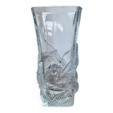 Large moulded glass vase with a floral design