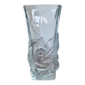 Large moulded glass vase with a floral design