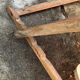 Vintage deck chair with orange and grey striped fabric, original patina.