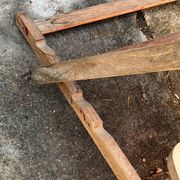Vintage deck chair with orange and grey striped fabric, original patina.