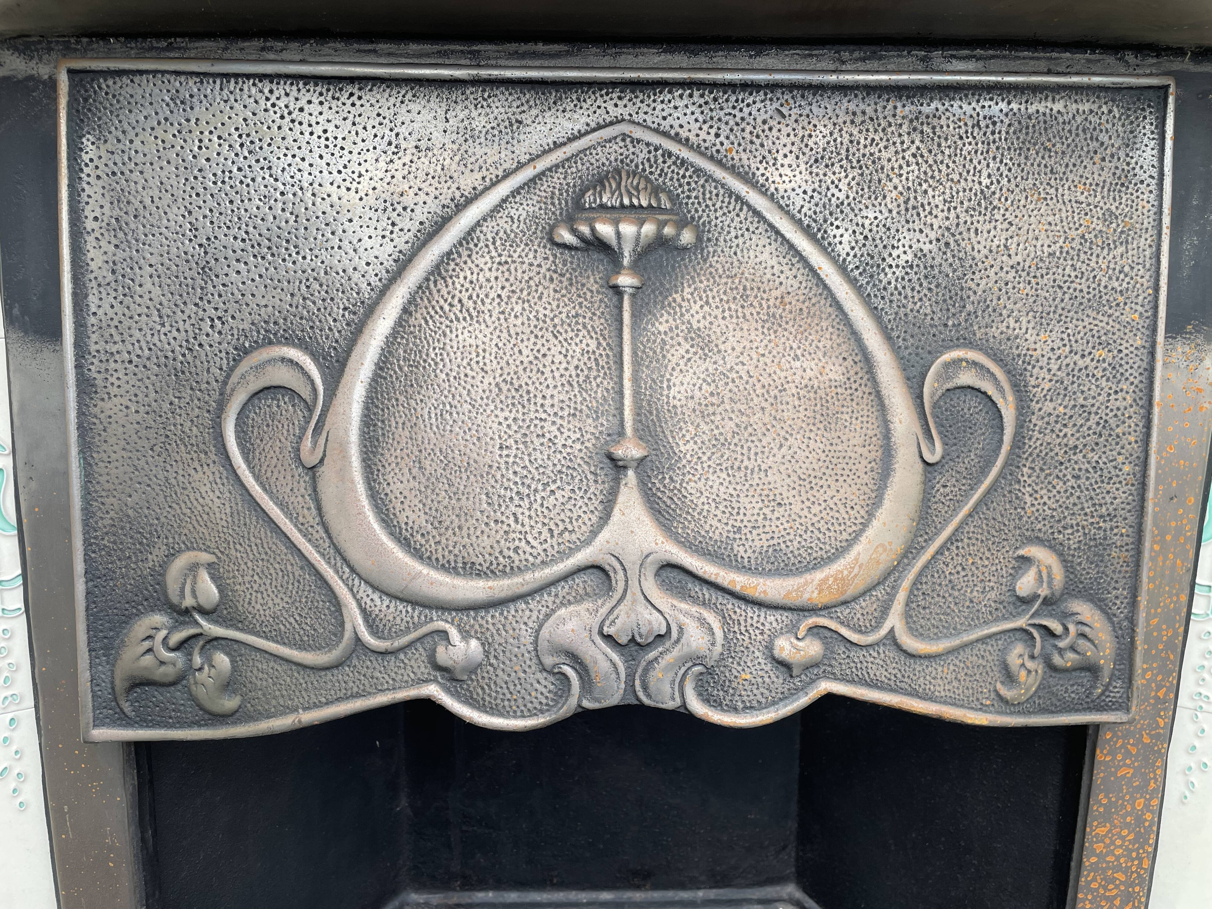 Open cast iron fireplace, Art Nouveau style