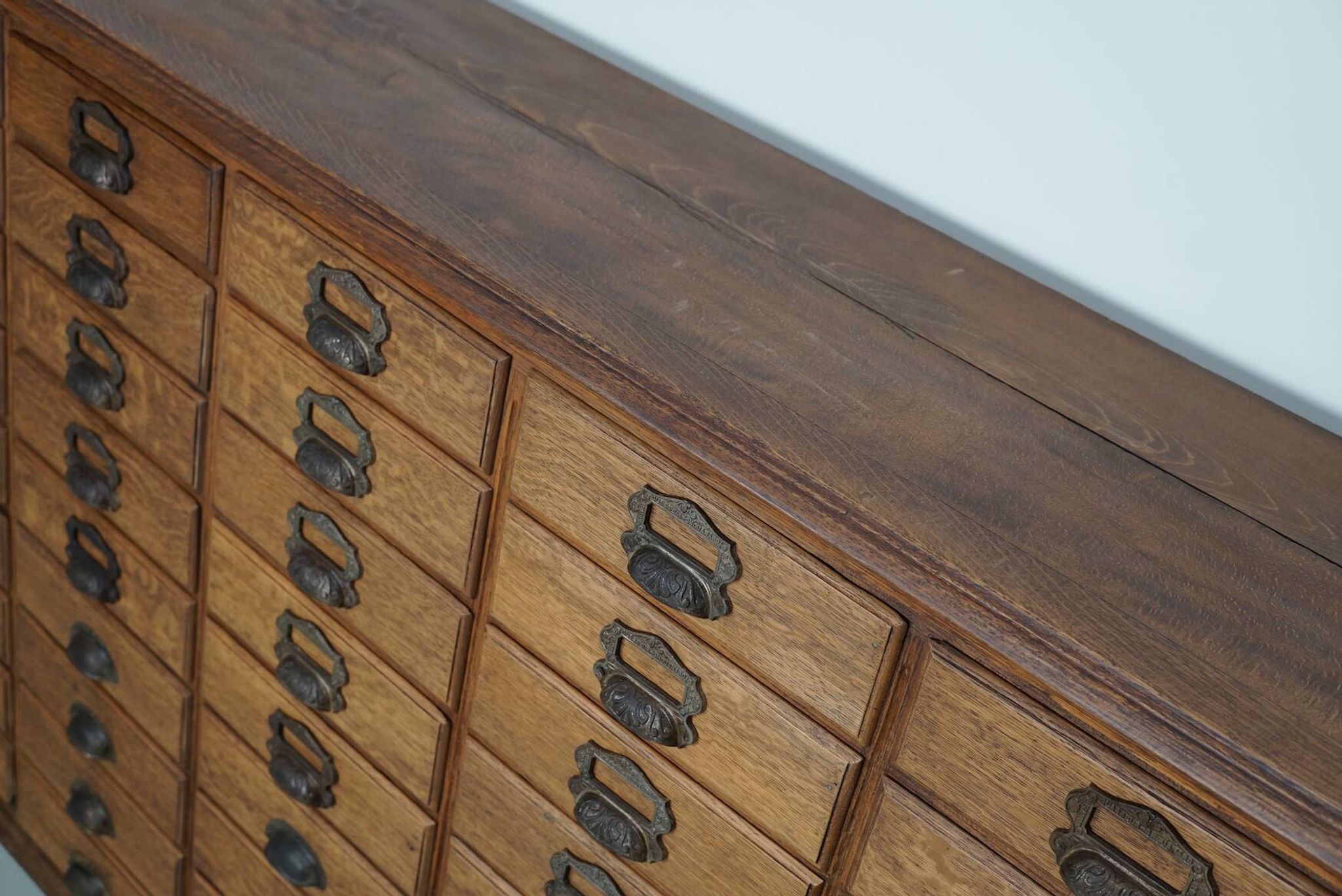 Antique French oak filing / apothecary cabinet by Chouanard, ca 1910