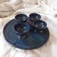 4 coquetiers on their midnight blue sandstone plate.