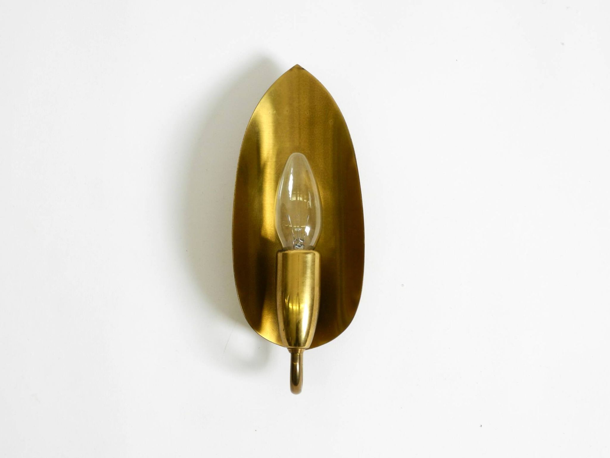 Beautiful original Mid Century Modern cone wall lamp made of brass