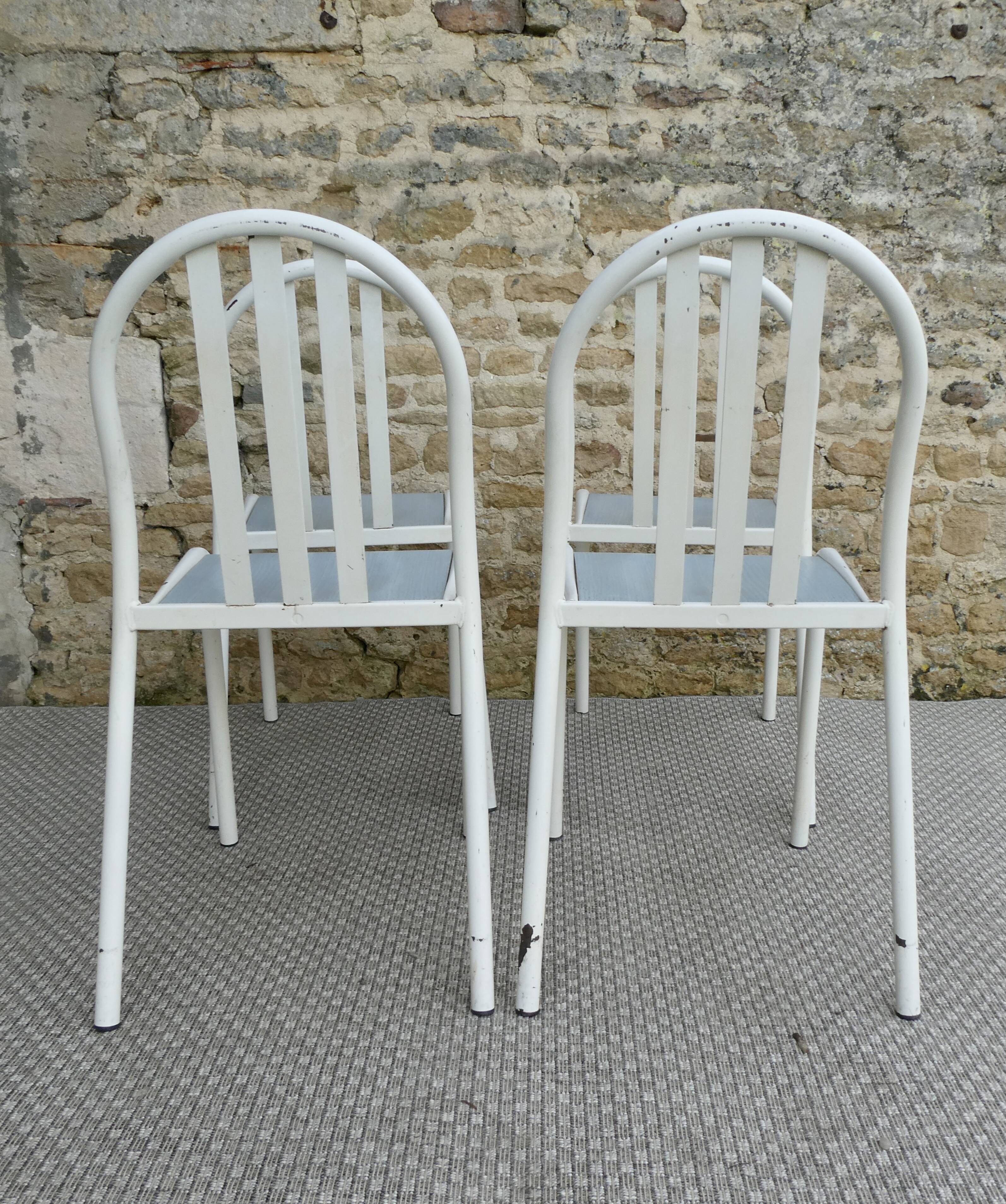 Set of 4 chairs by Robert Mallet-Stevens, 1960s.