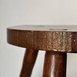 Varnished wooden stool with three legs