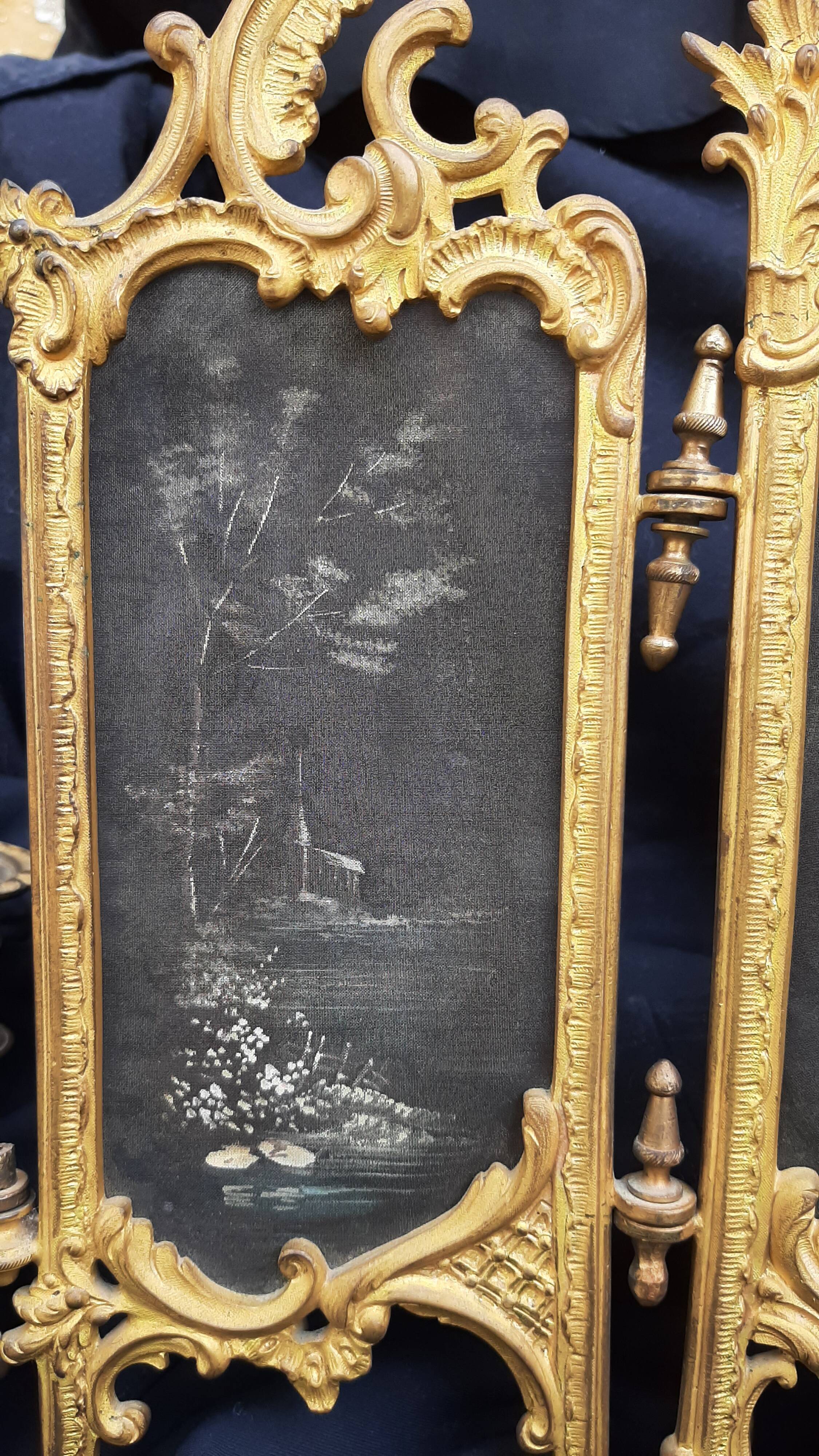 Ancient tryptic in gilded bronze, candlestick