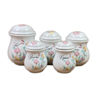 Series of white ceramic spice pots floral decoration