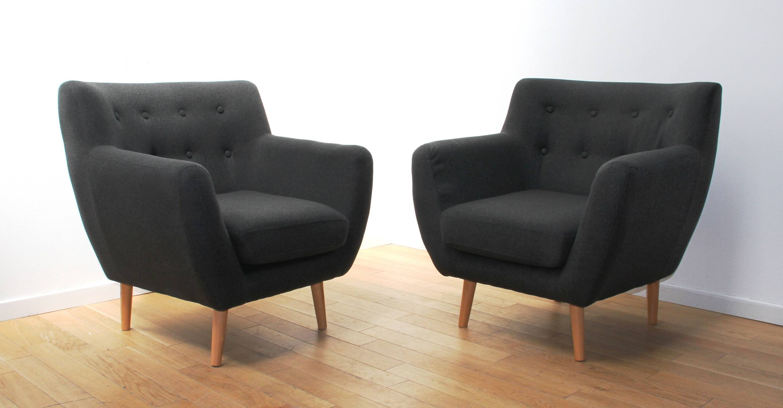 Pair of designer armchairs