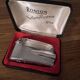 Vintage Ronson Varaflame chrome lighter and its original case.