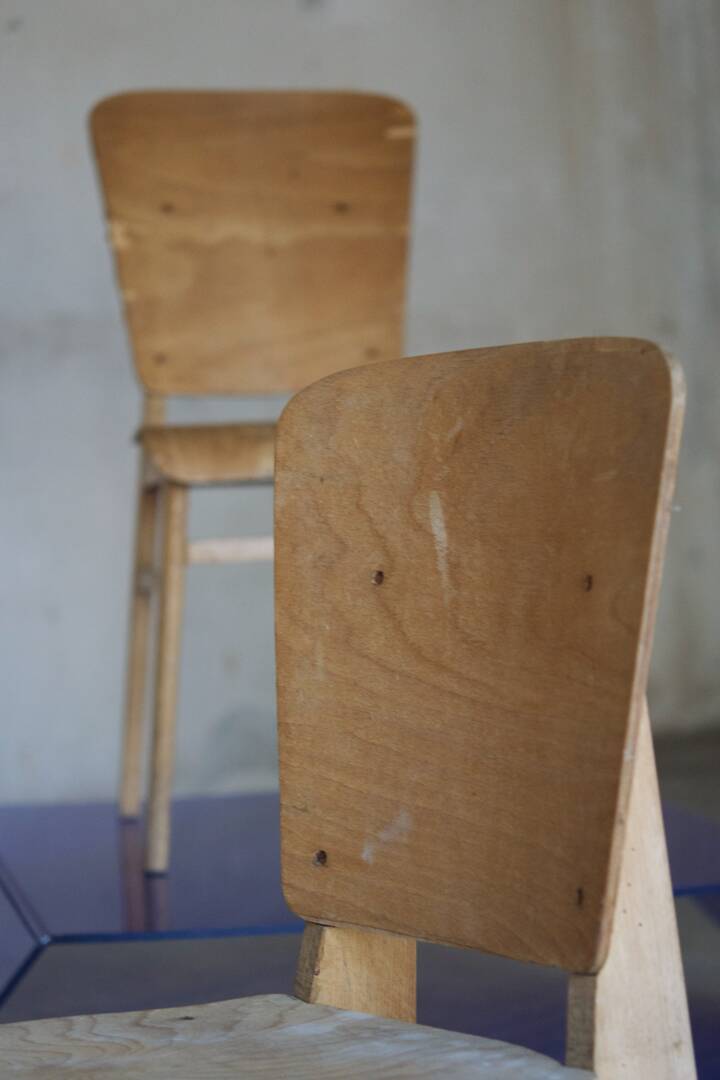 two  style wooden chairs