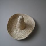 Hand-woven wicker straw hat, ethnic decoration object, sombrero, handmade