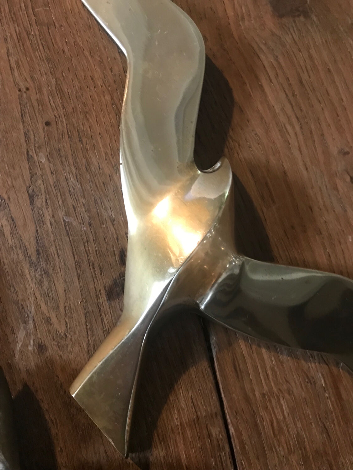 Pair of brass swallows