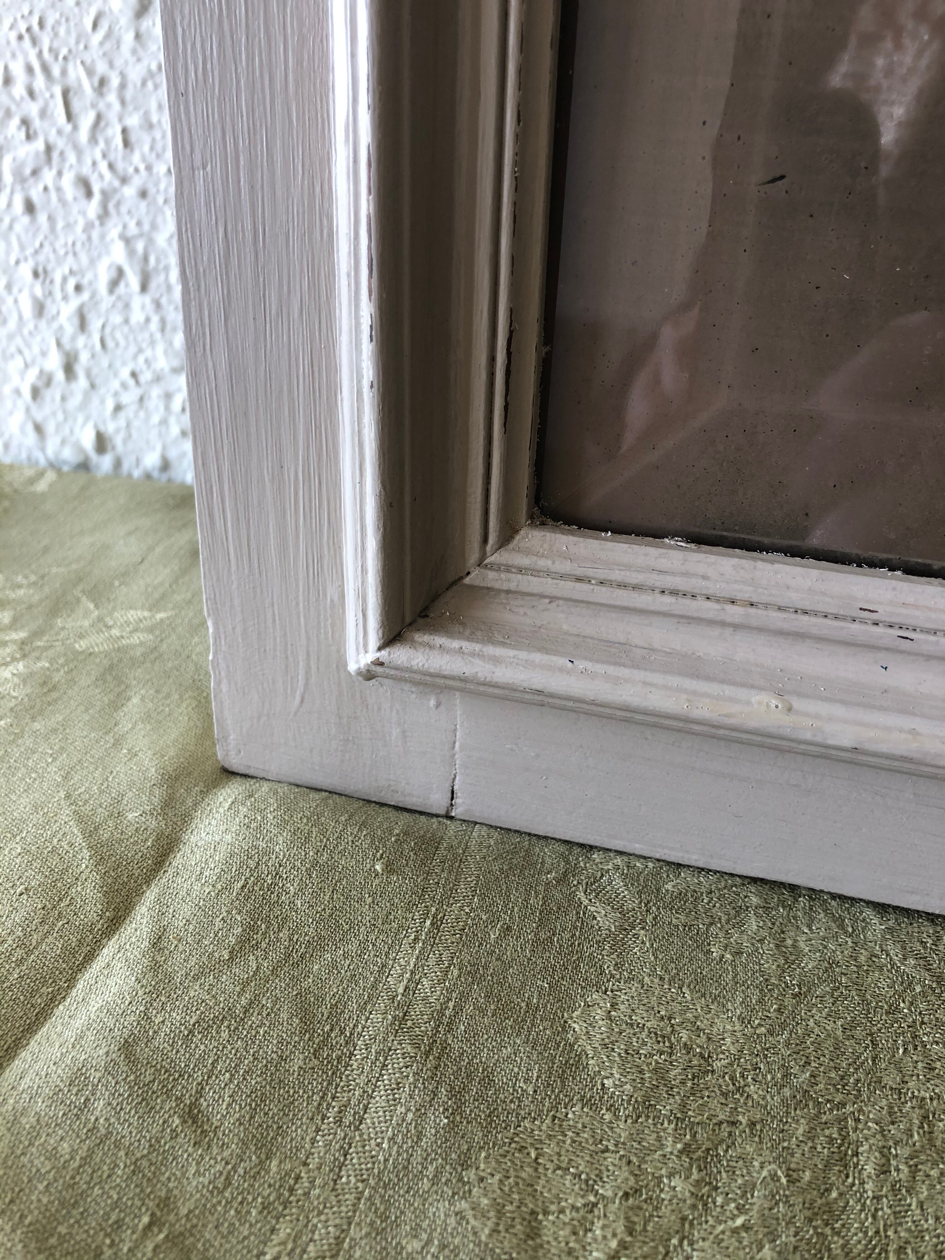 Large patinated wooden mirror with bevelled ice 73x113cm