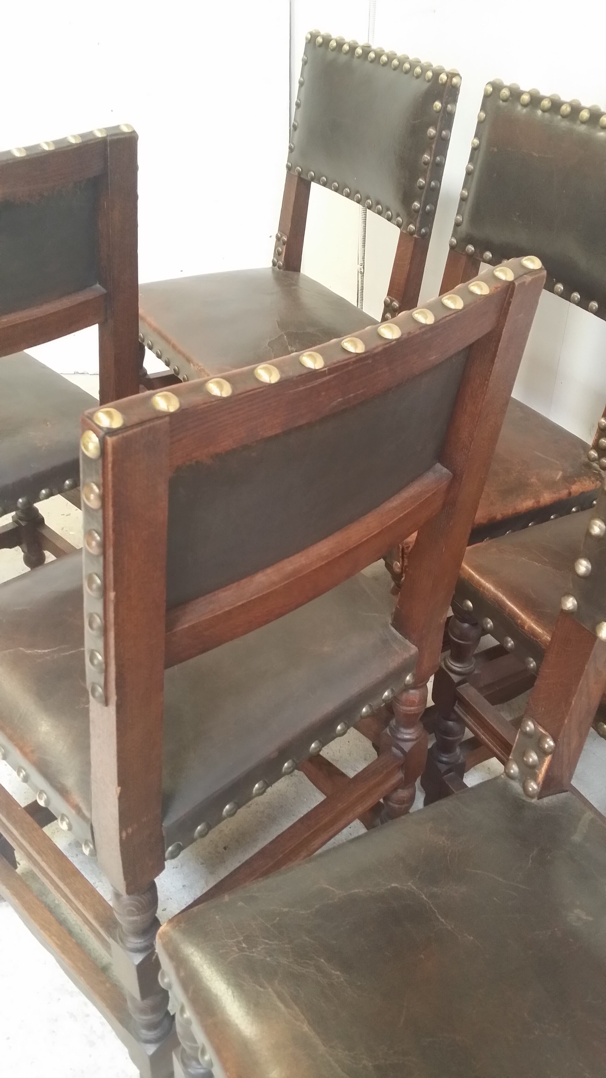 a set of six leather chairs and nails