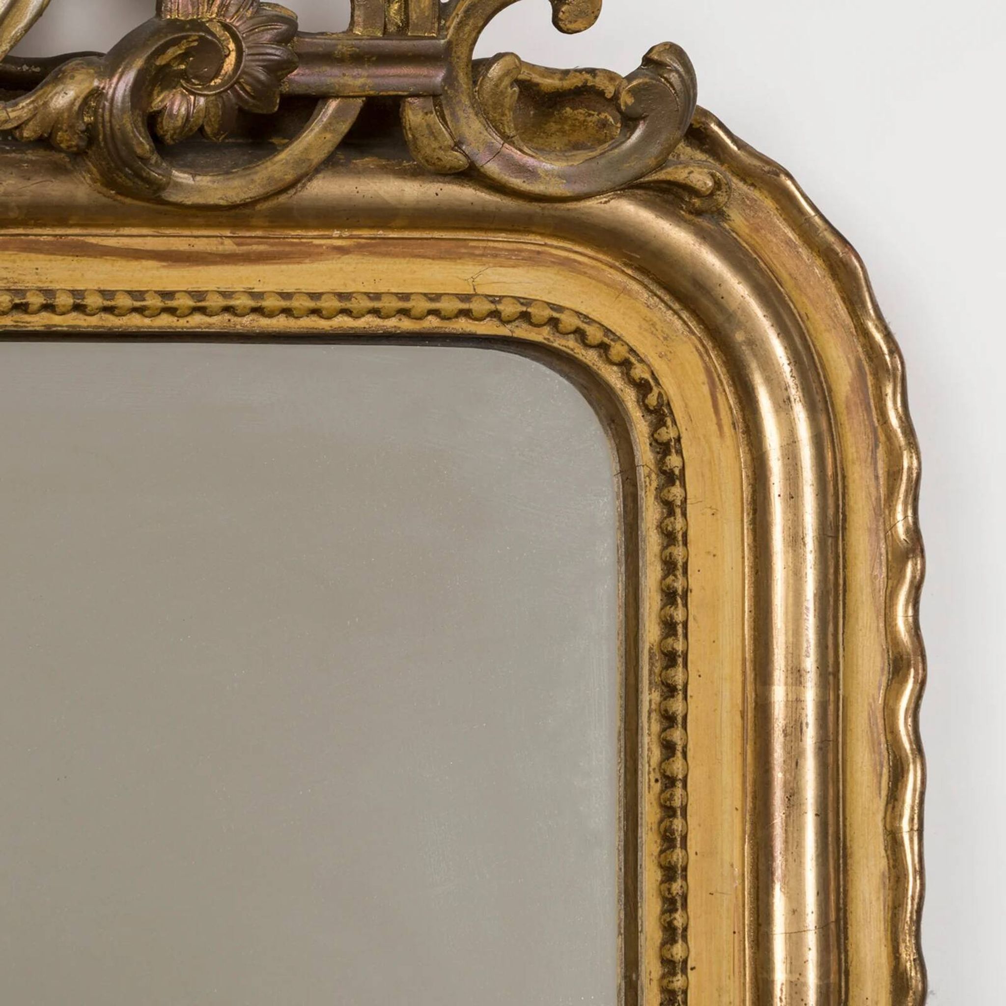 19th C antique yellow gold antique mirror with crest