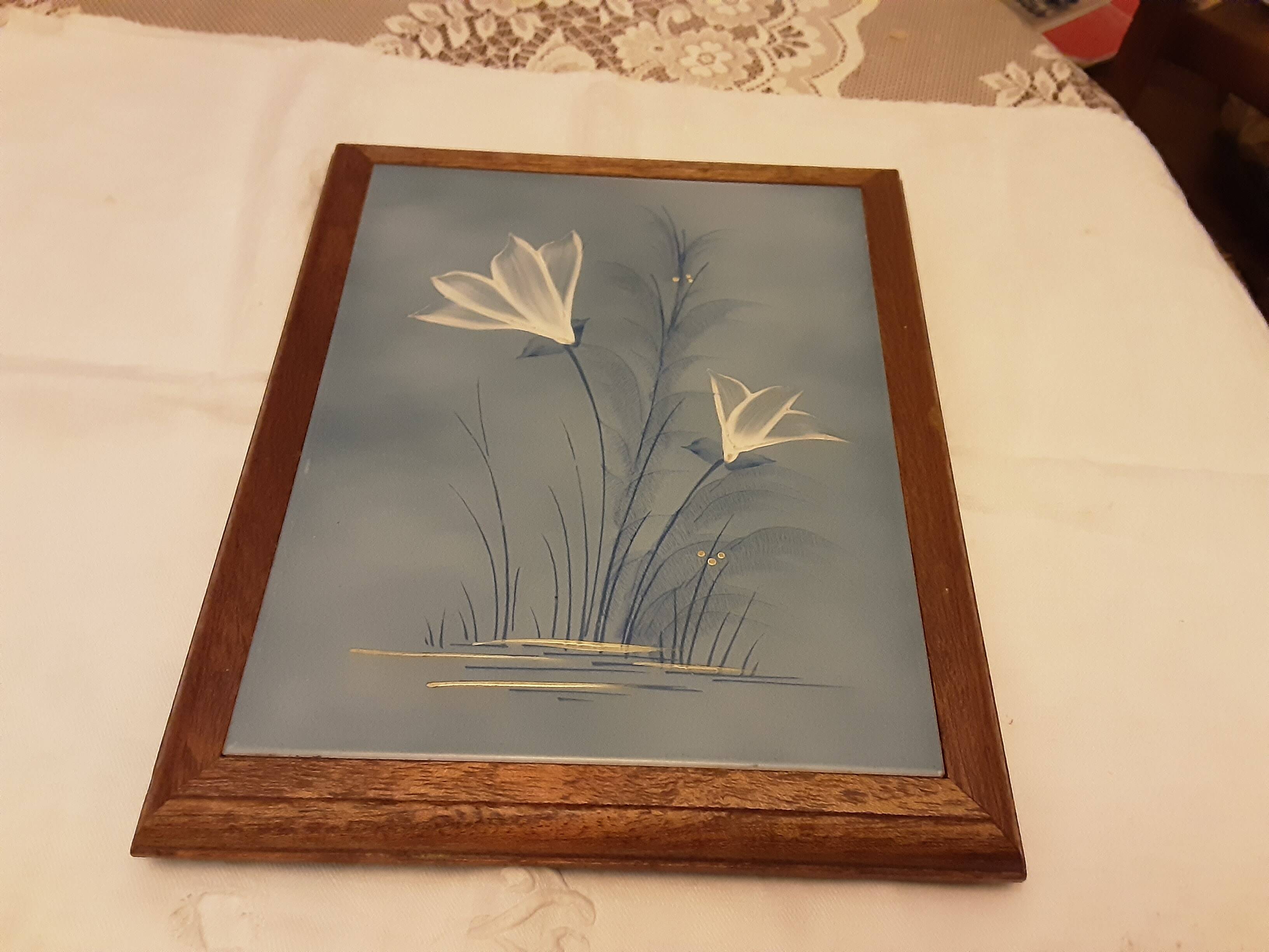 Blue tile trives enameled flowers