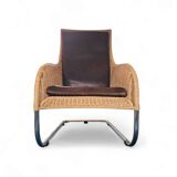 2 x Weighty rattan lounge chair / brown leather 1990s  Very good condition