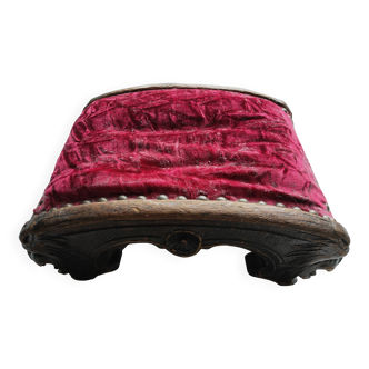 Red velvet footrest or prie-dieu