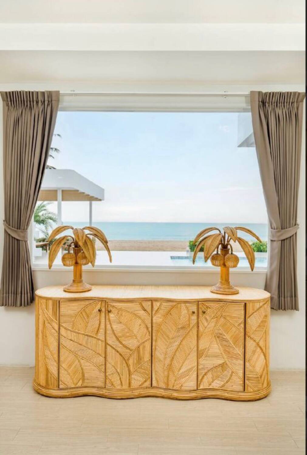 Pair of rattan "palm" lamps