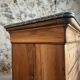 French antique walnut commode with a dark grey marble top, circa 1830–1860.