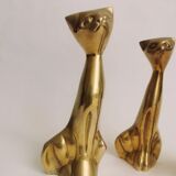 Trio of cats in gilded brass